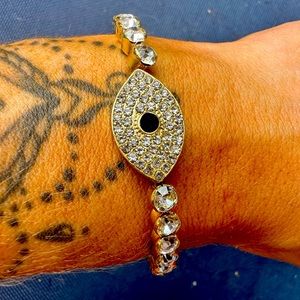 Evil eye gold tone bangle